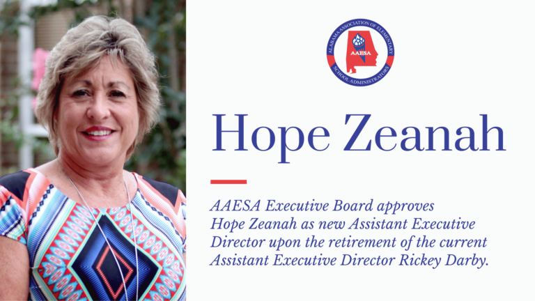 Hope Zeanah, newly appointed Assistant Executive Director of AAESA, smiling in a colorful patterned top.